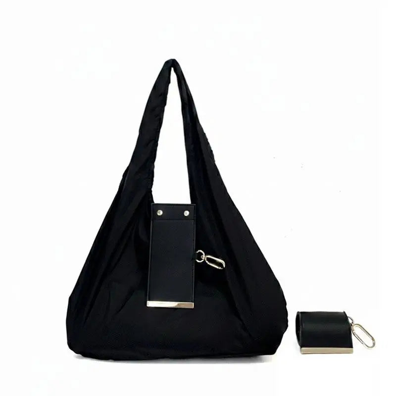 The Tiny Keychain Tote That Opens Into a Full-Size Shopping Bag
