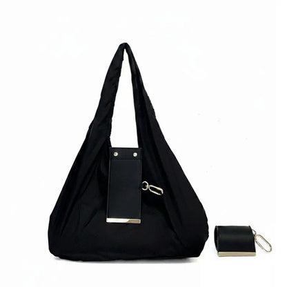 The Tiny Keychain Tote That Opens Into a Full-Size Shopping Bag