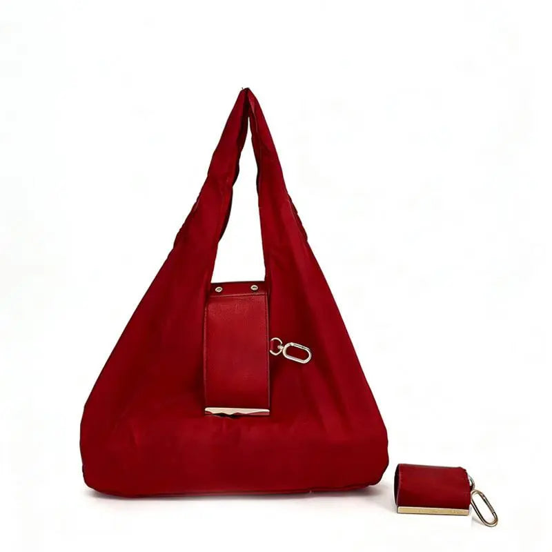 The Tiny Keychain Tote That Opens Into a Full-Size Shopping Bag