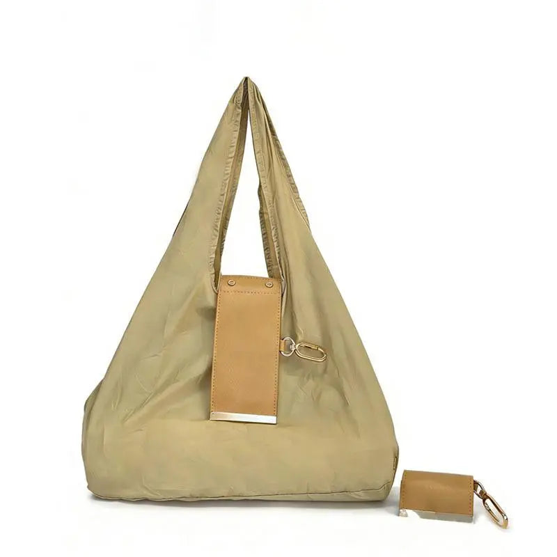 The Tiny Keychain Tote That Opens Into a Full-Size Shopping Bag