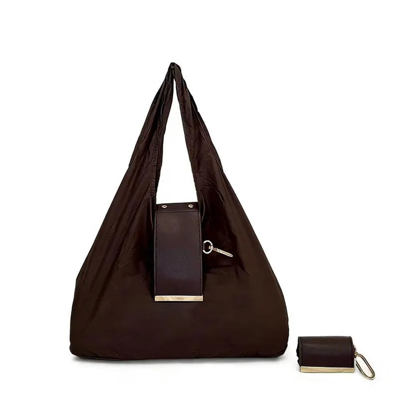 The Tiny Keychain Tote That Opens Into a Full-Size Shopping Bag