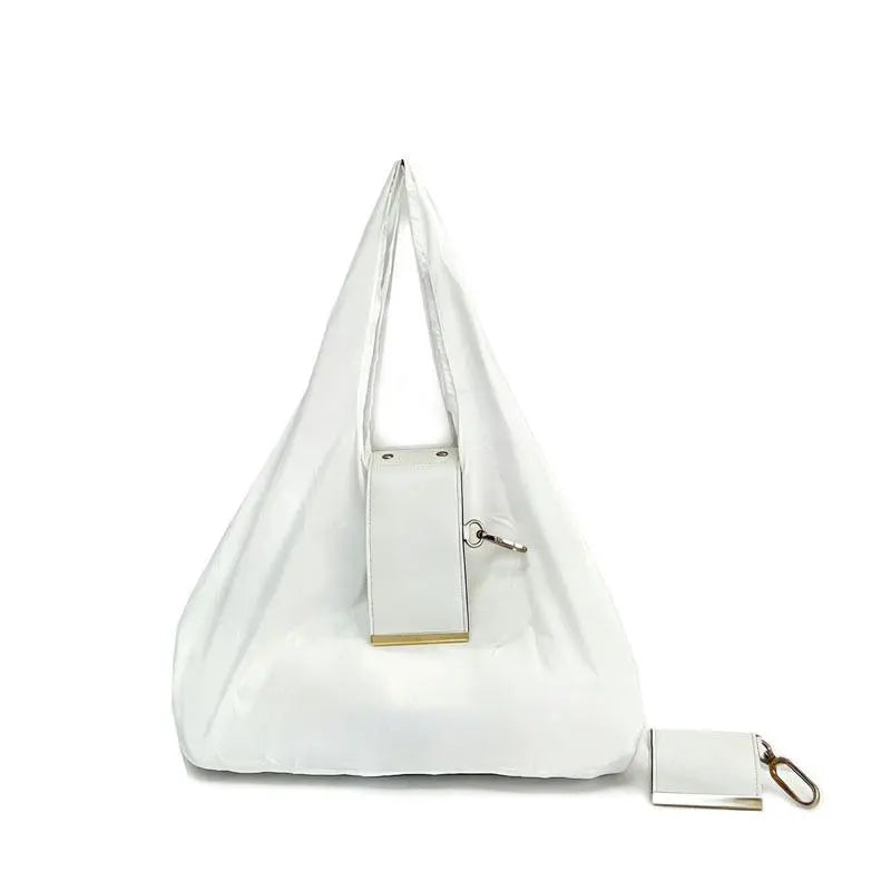 The Tiny Keychain Tote That Opens Into a Full-Size Shopping Bag