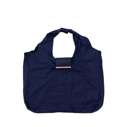 The Tiny Keychain Tote That Opens Into a Full-Size Shopping Bag