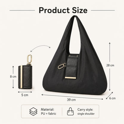 The Tiny Keychain Tote That Opens Into a Full-Size Shopping Bag